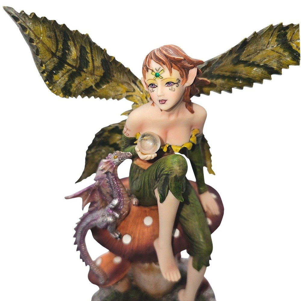 Green Fairy Figurine with Leaf Wings and Baby Dragon Companion